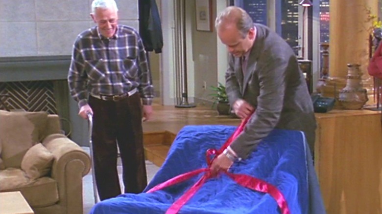 Frasier unwraps a new chair for Martin