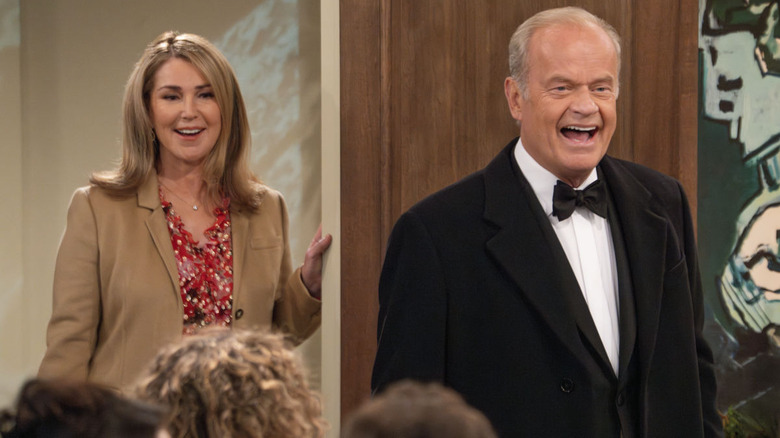 Frasier and Roz smiling in courtroom