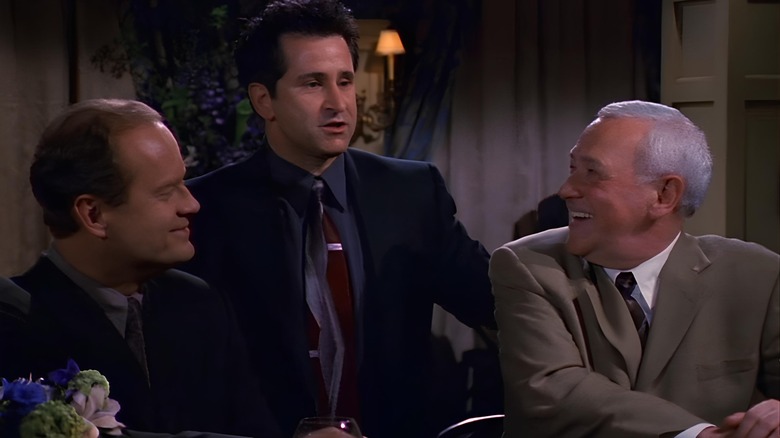 Frasier and Martin smiling at Simon