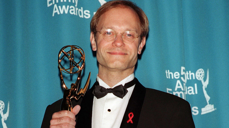 David Hyde Pierce holding an Emmy