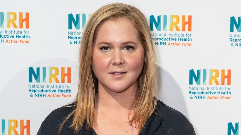 Amy Schumer staring ahead