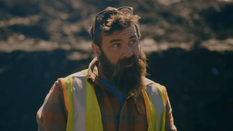 Fred Lewis smiling in a safety vest