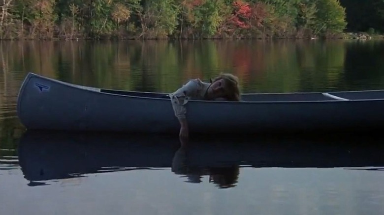 Alice floating in canoe
