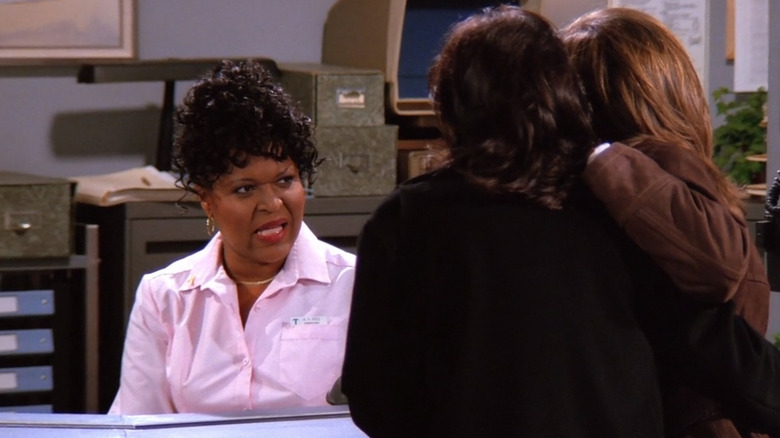 The Admissions Woman talks to Rachel and Monica on "Friends"