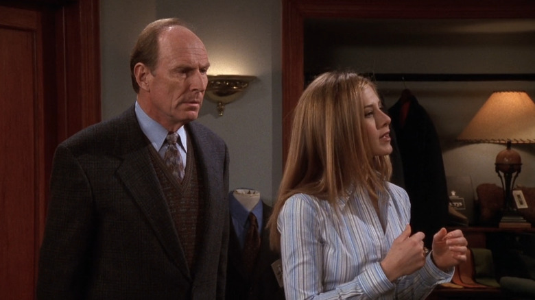 Mr. Waltham stands behind Rachel on "Friends"