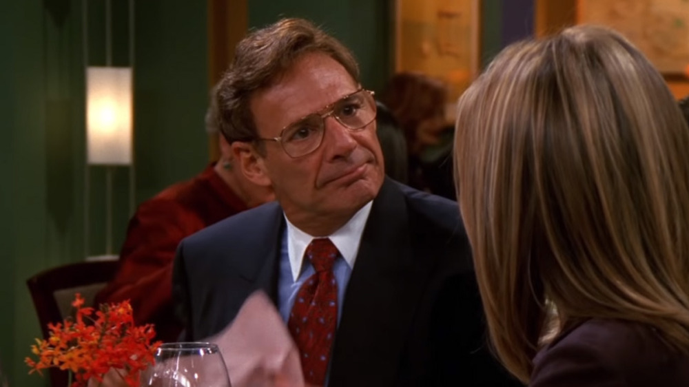 Dr. Green glares at Rachel on Friends