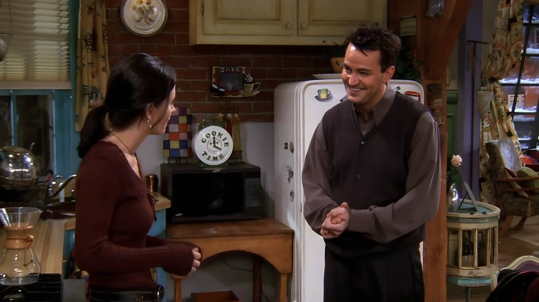 Chandler smiling at Monica