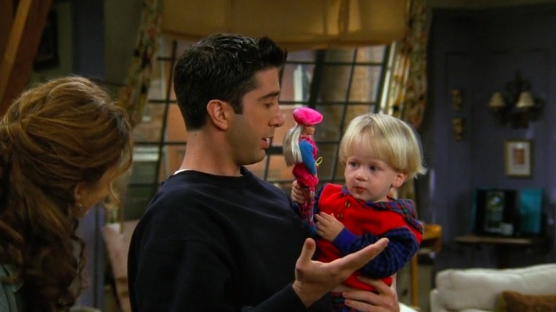 Ross holds Ben 