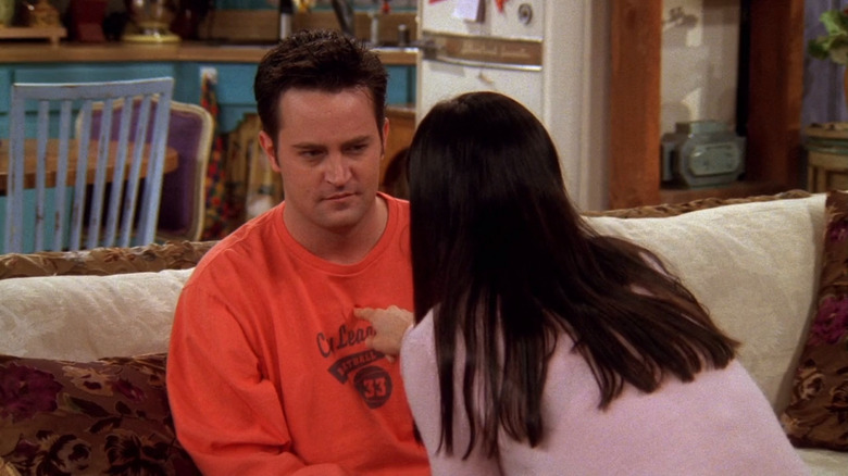 Monica points at Chandler's chest