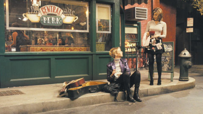 Friends Phoebe and Rachel outside Central Perk