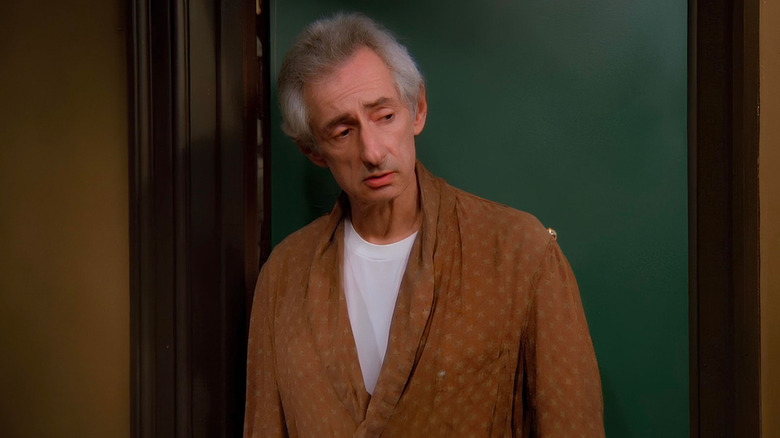 Mr Heckles stood at his door