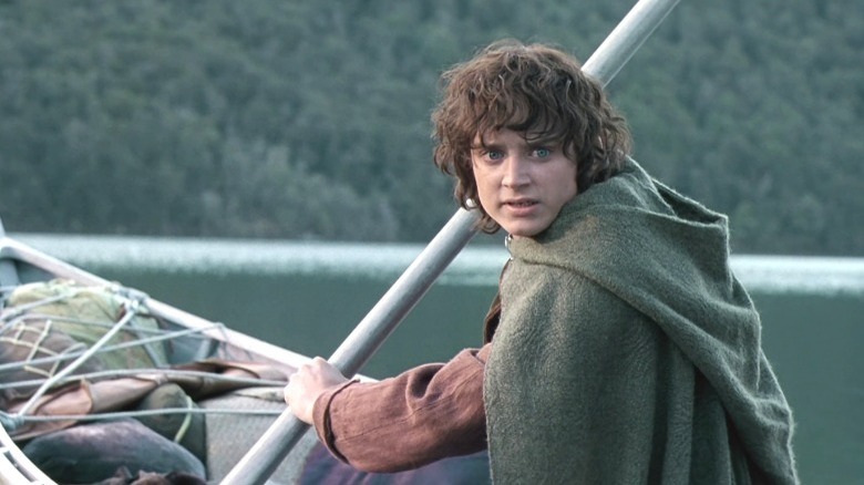 Frodo rowing a boat