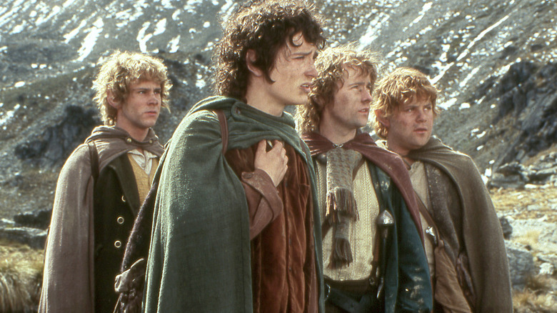 Four Hobbits traveling together