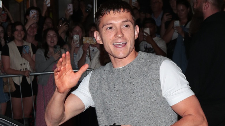 Tom Holland waving