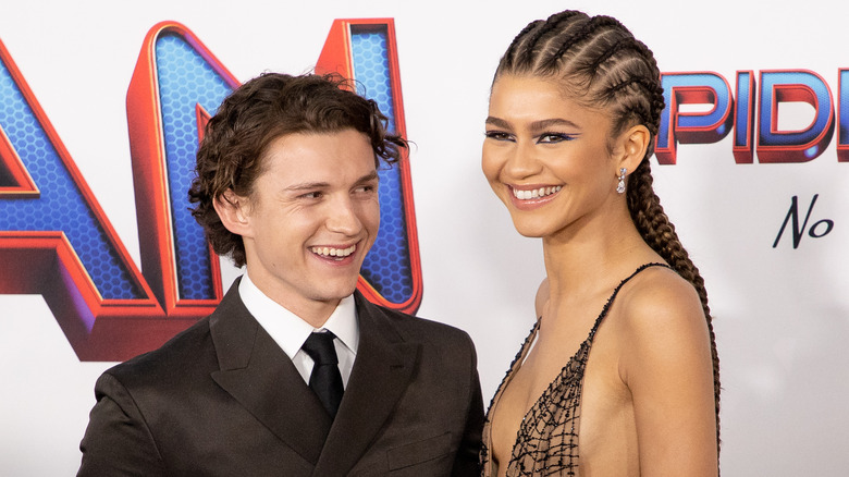 Tom Holland smiling at Zendaya