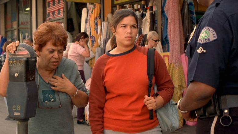 Ana and Carmen talking to police officer