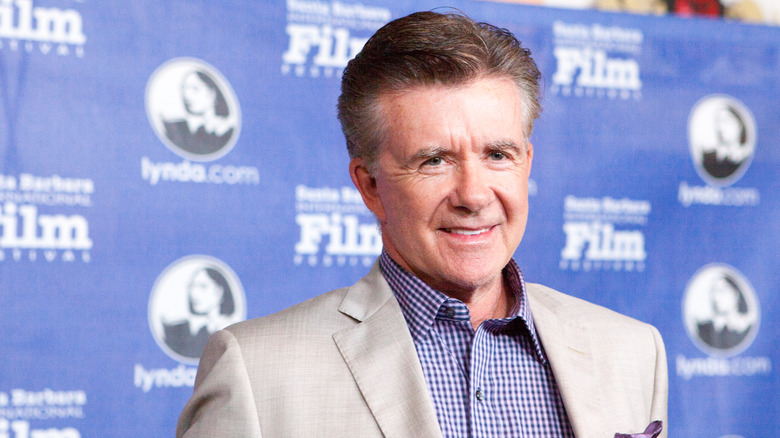 Alan Thicke smiling at event