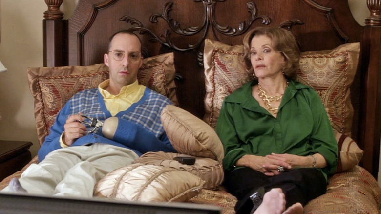 Lucille and Buster Bluth in bed