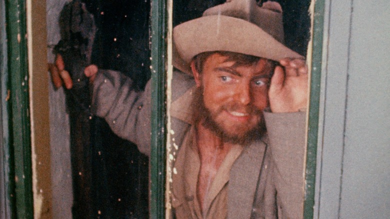 Torgo looking creepily through window