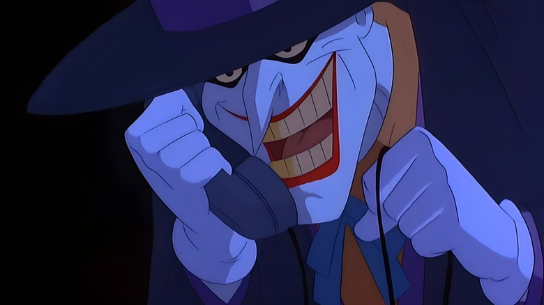 The Joker smiling sinisterly