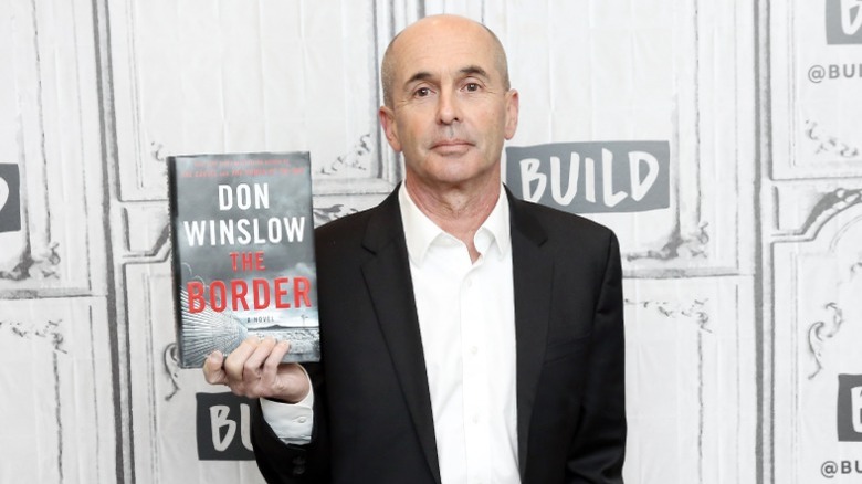 Don Winslow holding up The Border