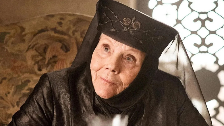 Olenna tilts her head