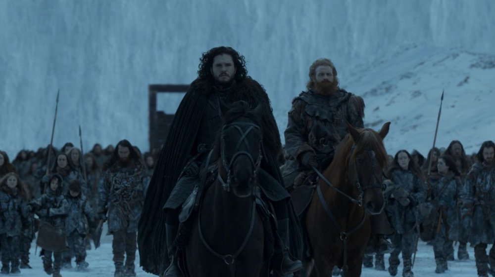 Kit Harington as Jon Snow beside Kristofer Hivju as Tormund Giantsbane, heading into the North on Game of Thrones