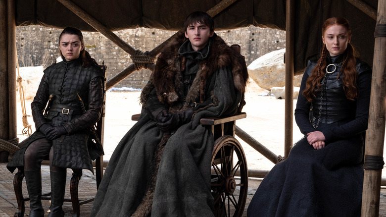 The Starks look on