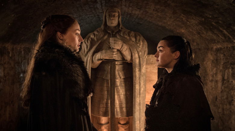 Arya confers with Sansa