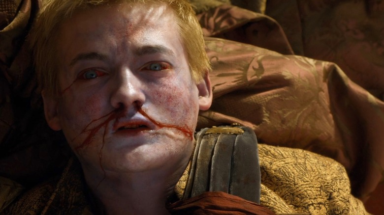 Joffrey Baratheon deceased with purple-tinged skin and blood coming from his nose