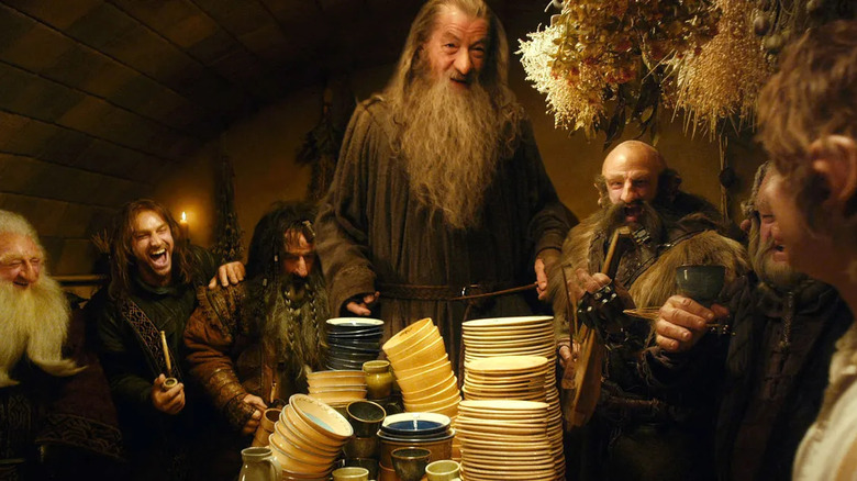 Gandalf surprises Bilbo with dinner guests