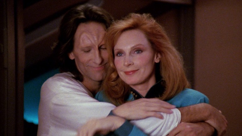 Beverly Crusher Odan smiling embrace