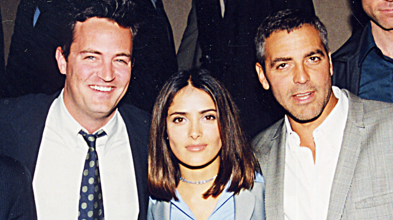 Clooney Perry Salma Hayek smiling