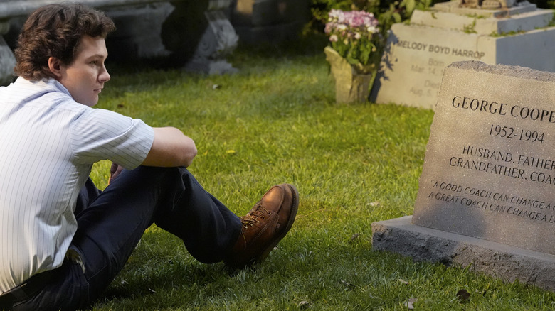 Georgie at George Sr.'s grave