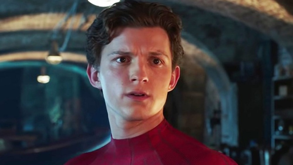 Peter Parker looks concerned in Spider-Man suit