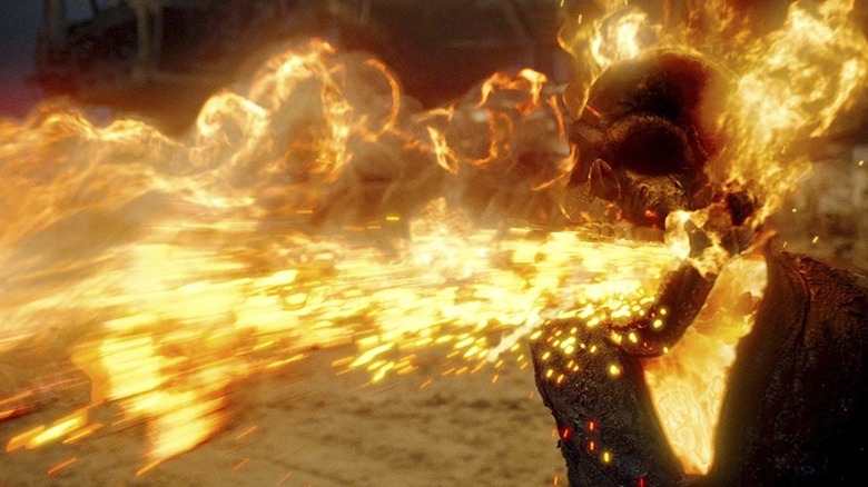 Ghost Rider unleashing a stream of fiery bullets