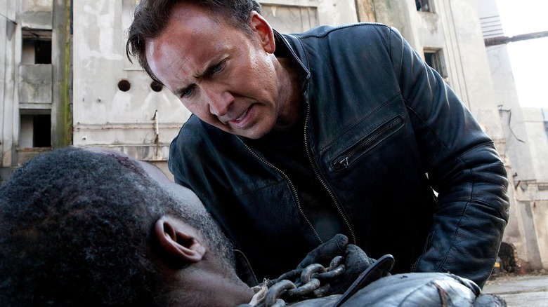 Nicolas Cage confronting Idris Elba