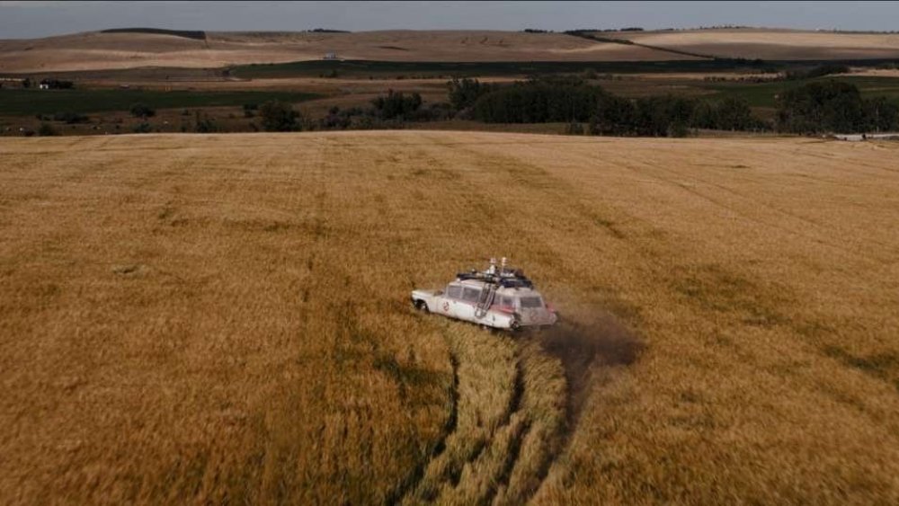 ECTO-1 driving through a field