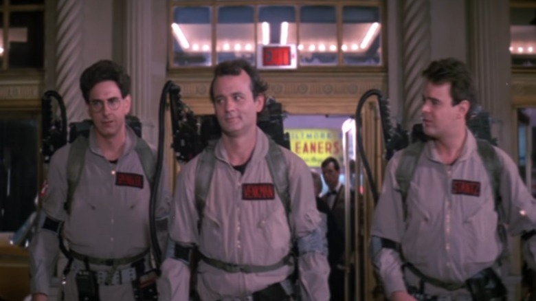 Harold Ramis, Bill Murray, and Dan Aykroyd talking in Ghostbusters