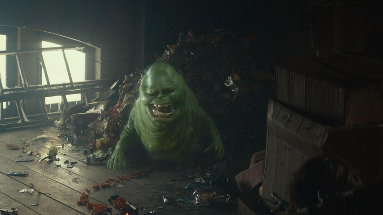 Slimer emerging from trash