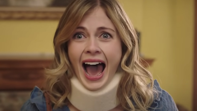 Rose McIver in neck brace screaming on Ghosts