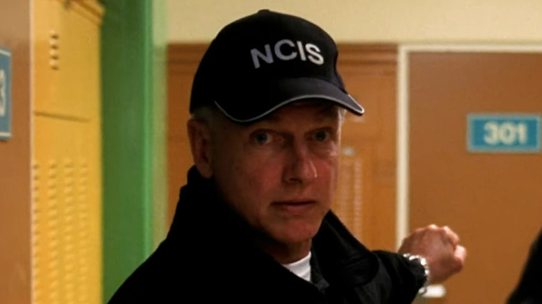 Gibbs pausing in a hallway