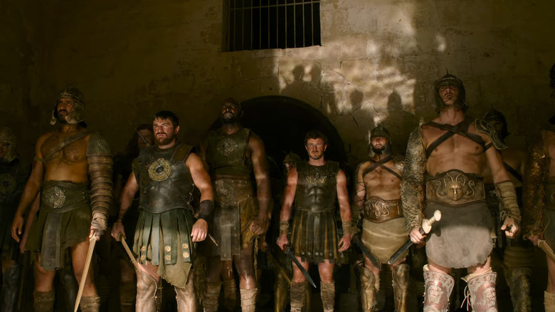 Maximus surrounded by soldiers