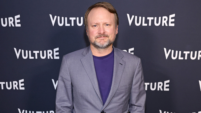 Rian Johnson posing at event 