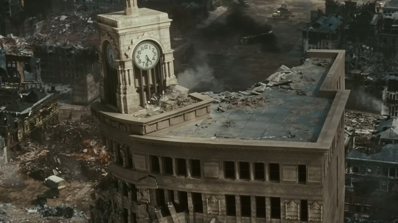 Clock tower in a destroyed city