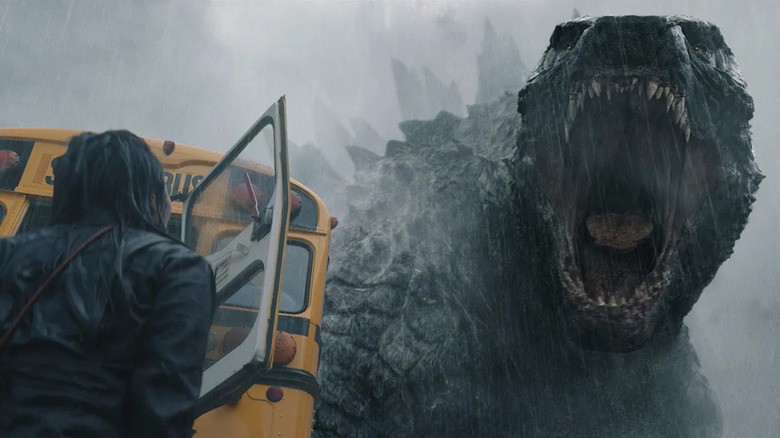 Godzilla roaring by school bus