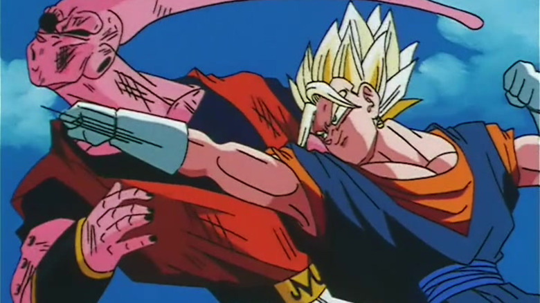 Vegito punching Buu