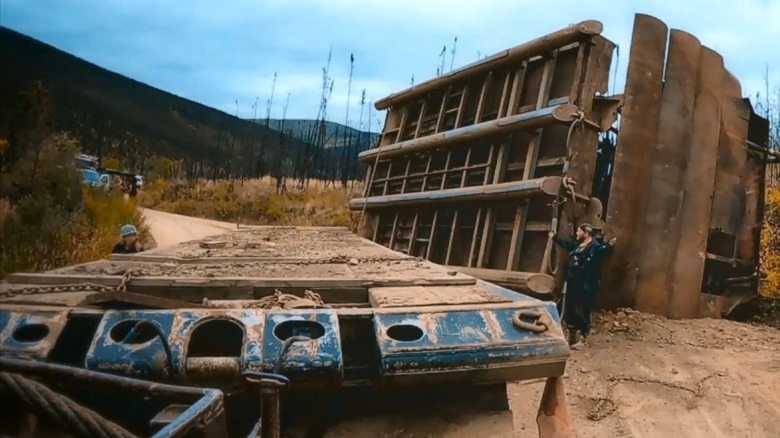 Tony and Mike Beets at overturned wash plant