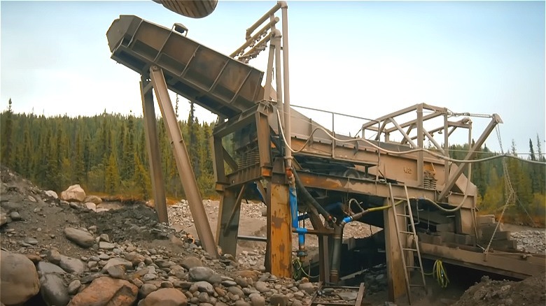 Gold mining equipment runs at Rick Ness' site 