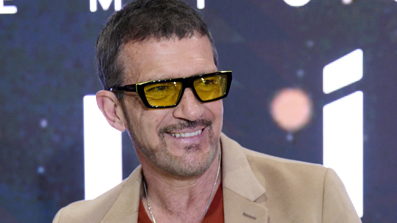 Antonio Banderas wearing yellow sunglasses